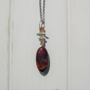 Bronze and sterling pendant with red jasper drop
